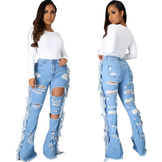 Distressed side fringe jeans